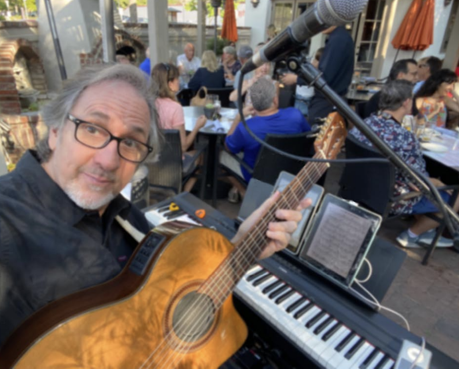 Mike Hamilton with a Guitar